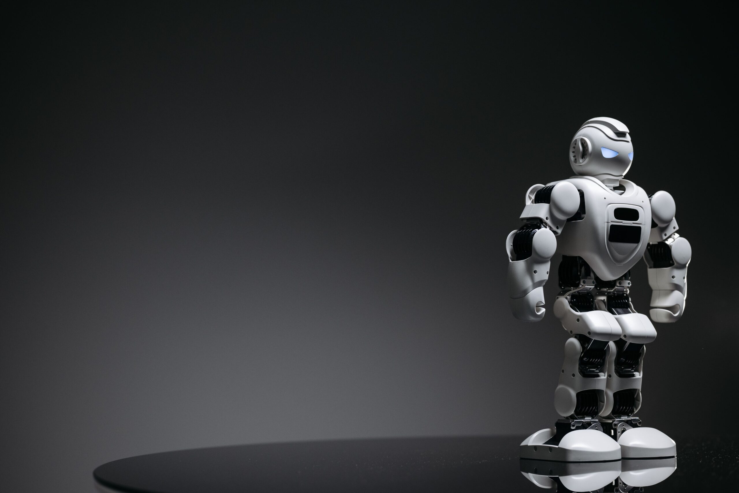 Compact humanoid robot standing upright, representing humanoid robot Singapore front-of-house deployments